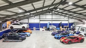 Supercar collection inside performance garage