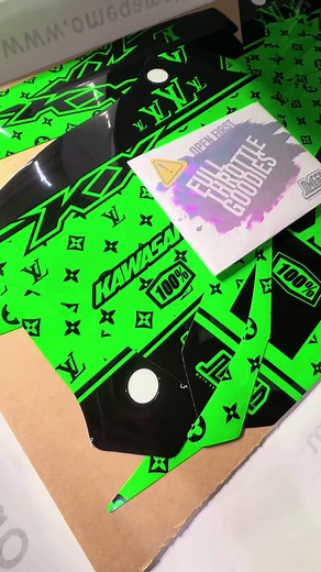 Green Custom Dirt Bike Graphics for Motocross Enthusiasts