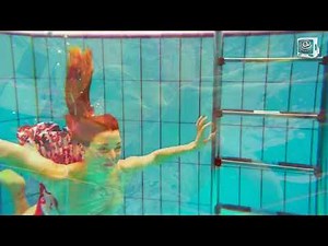 I test my gopro with gentle girlfriend who makes an aquatic choreography at the pool