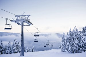 Why Are Ski Lifts So High Off the Ground? - newtoski