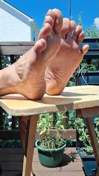 Relaxing my big male feet in the sun after a long trek