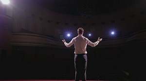 Man introduces himself to seminar audience - Free Stock Video