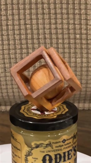 Impossible Infinity cube with captured sphere carved from single block of wood #carving #woodwork