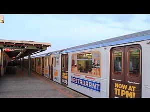 IRT Subway: Seinfeld Ad-Wrapped R62A (7) train at 82nd St