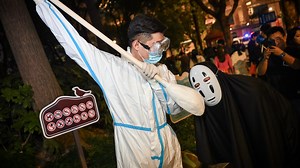 Sign of the times: Halloween with Chinese characteristics takes flight in Shanghai as cultural jamboree sees young lampoon public figures