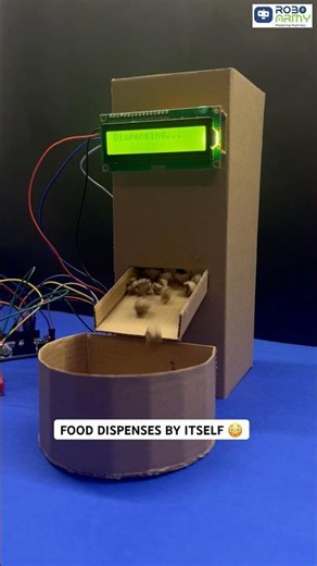 Press → Dispense → Eat 😋DIY automatic food dispenser 🤖 #roboarmy #arduinoprojects #fooddispensar