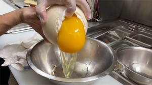 They crack into an OSTRICH EGG for the biggest breakfast of all time! 😱 One ostrich egg = about 24 chicken eggs 🥚 Get it at Fine and Rare! #FoodNetworkFinds Want more giant foods? Take Arlyn Osborne's Giant Apple Cinnamon Roll class on-demand on the Food Network Kitchen app: https://food-network.app.link/FxS80dZ7m4 👍 | Food Network Finds