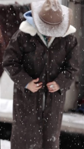 @a_sagebrush_cowgirl holding onto these final moments of winter in her Outback duster and wool button in liner! ❄️ Although winter is tough it sure is beautiful! #outbacktradingcompany #western #westernfashion #winter #winterfashion #oilskin #duster #wool #liner #westernstyle #westernvideography #videography | Outback Trading Company LTD.