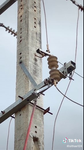 Close-Up of Electrical Utility Pole and Transformers