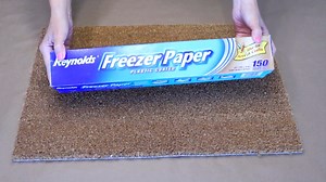 The genius reason she covers her doormat with freezer paper for Christmas! | Hometalk