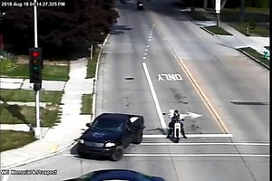 Appleton Police say this video shows a shooting that happened in broad daylight. Officers say the biker and the truck's driver are members of rival motorcycle clubs. Full story: http://www.wbay.com/content/news/Appleton-Police-release-video-of-motorcycle-club-rivalry-shooting-491294991.html | WBAY TV-2