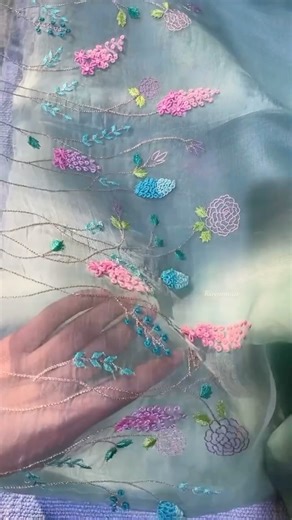 Kavana on Instagram: "Hand embroidery on organza has a totally different feel compared to other fabrics. The sheer, see-through quality of organza really makes the hand-stitches pop, highlighting every little detail. It gives the embroidery a delicate, airy look that feels light and elegant. It’s this mix of transparency and texture that makes it so special and eye-catching. ✨ #handcrafted"