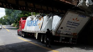 Tractor trailer hits Schenectady overpass, shears off roof