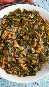 This southern collard greens recipe makes the best collard greens I've ever had, with lots of bacon and smoked ham, simmered low and slow until so tender. You'll never want them any other way! 😍 GET THE RECIPE: https://www.chilipeppermadness.com/recipes/collard-greens/ | Chili Pepper Madness - Recipes & More from a Gourmet Chilihead