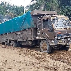 Orange Cat Fights Hard through the Deep Hole #STUCK #slippery #slipperyslope #mudding #mud #trucking #truckdriver #offroadracing #offroadtrip #offroadadventure #offroadtrucks #offroading | Trojen Ranjo