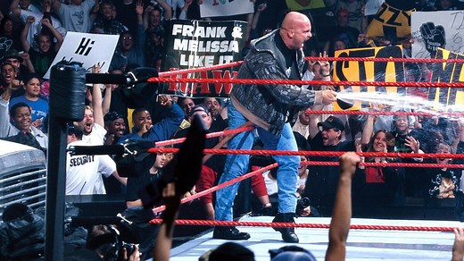 "Stone Cold" Steve Austin gives The Corporation a beer bath