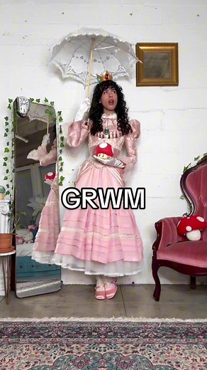 I give you Princess Peach! 👑🍄 . Outfit Details: Dress: @LaceMade Lace Top: @Goodwill Industries Intl. Pearl Pin: vintage from my grandparents Petticoat: JetRag Vintage dollar pile Corset: LaceMade Waist Corset: LaceMade Gloves: @Amazon Lace socks: @Princess Polly Shoes: @JDYSW Shoes Silk Robe: Goodwill Peach Crown & Pendant: Amazon Parasol: Amazon Power Mushroom: @target Hair: @FullShineHair . #grwm #princesspeach #peachcosplayer #princesspeachcosplay #princesspeachcostume #ootd #howtostyle #c
