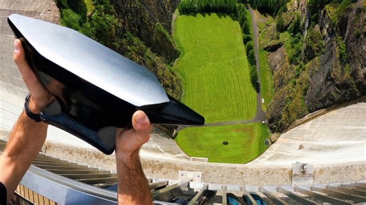 Watch what happens when an anvil is dropped on a car from a 540 ft dam