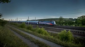 8 Incredible Night Train Journeys Around the World — With Stunning City, Mountain, and Lake Views