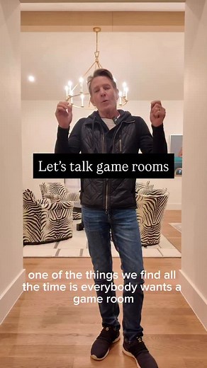 Game rooms aren’t one-size-fits-all. In this home, you get a full bar, a lounge area, and a couch zone that can easily transform into a pool table or any game configuration you can dream up. #leconstructionllc #luxuryhomes #construction #gameroom #dreamhome | LE Construction, LLC