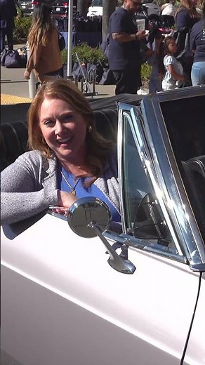 Classic car club cruises through Sharp Chula Vista to deliver care bags for cancer patients