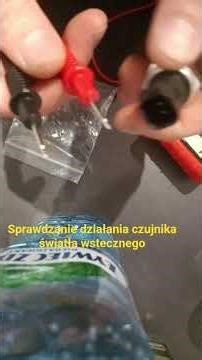 sprawdzanie działania czujnika światła wstecznego