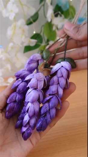 DIY pistachio shell craft ideas How to make a wisteria flowers with pistachio shell #facebookreelsviral #diytools #howtomake #art #craftideas #women #diyflowers #facebookviral #viralvideochallenge #flowers #pistachio | Eram Art