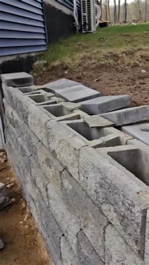 Versa block retaining wall for the win! Caps and tied into a stone wall #landscaping #home #diy