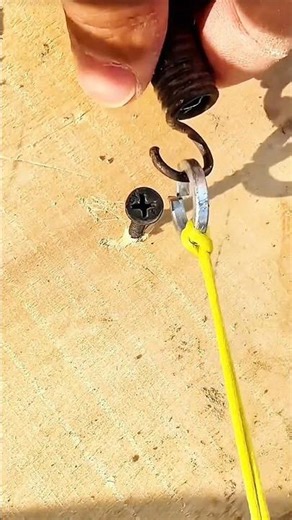 Simple DIY Spring Hook Setup Using a Screw and Nylon Cord #shortvideo
