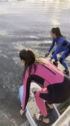 Gliding above glass water at sunset on dual e-foils! 🌅🏄‍♀️⚡