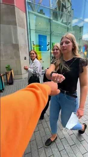 Guy Fist Bump Strangers for a Treat in the Streets