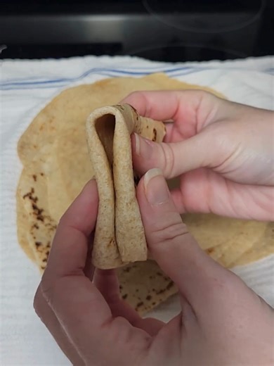 Fresh Milled Flour Tortillas I've had a ton of requests for a tortilla video so I hope y'all enjoy this one. I've struggled with tortillas for a long time, but my family really enjoyed this recipe -500g Soft White Wheat -50g Kamut (use hard white or just soft white if you must) -2tsp salt -1 1/2 tsp baking powder -8TBS melted butter -1 - 1 1/2 Cups warm water (I only used 1 1/4 of it) Mill your wheat and mix dry ingredients. Then Add your butter and slowly add your water as you mix. I only used 