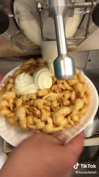 Funnel Cake Sundae topped w/ Vanilla Ice Cream, Powdered Sugar, Strawberries, Whipped Cream, and Chocolate! 😯🍨🍫🍓💦 #icecream #fried #funnelcake