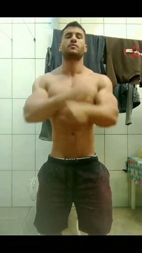 Hot muscle hunk bathroom flexing