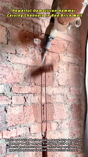 Powerful Demolition Hammer Carving Channels In Red Brick Wall