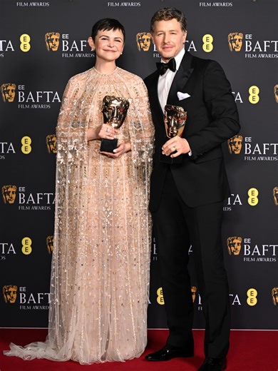 Just Jared | Married couple Ginnifer Goodwin and Josh Dallas pose with their awards after winning Best Animated Film for “Zootopia 2” at the... | Instagram