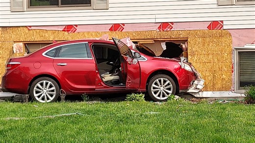 No one injured after car crashes into house