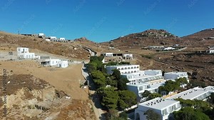 Greek islands in the Aegean. A popular tourist and cruise destination. Volcanic islands. Traditional greek architecture.