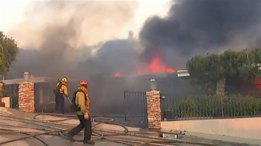 House disappears behind smoke as Palisades Fire grows, threatening residents