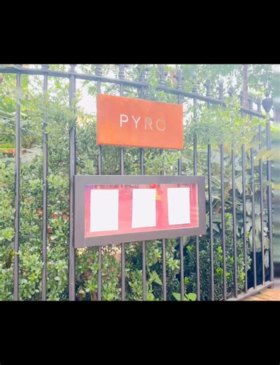 Amazing lunch at PYRO 🔥 A place that really understands fire — not just as heat, but as flavour, as technique, as identity. From the moment you walk up to the rusted steel sign and see the menu pinned outside, you know you’re in for something serious. Sat down, menu in hand, and straight away you see the philosophy: clean flavours, tight combinations, smart produce, everything kissed by flame, smoke or ember. Highlights? The courgette flower with basil and barrel-aged feta salad — bright, fresh