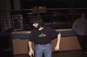 Bearded man owns the dance floor.