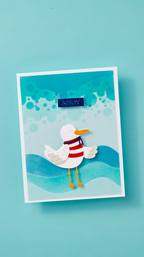 6.1K views · 95 reactions | Seas the day with June’s Stencil + Stitching Die Clubs.  Watch this wave-tastic card come to life with the Rolling Tide stencil and our oh-so-dapper seagull. It's shore to make you smile! ⚓ Join the Clubs - https://spellbinders.shop/40F0NvM #neverstopmaking #spellbindersclubkits #stencil #cardmaking | Spellbinders Paper Arts | Facebook