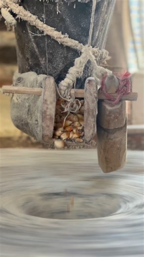 madeinnepal on Instagram: "The watermill, locally known as “ghatta” or “pani ghatta,” holds significant cultural and economic value in Karnali Province, Nepal. These traditional mills, commonly found along rivers and streams in remote hilly villages like Humla, Jumla, Kalikot, and Mugu, harness the kinetic energy of flowing water to grind grains such as maize, barley, millet, and wheat. Built using locally available materials like stone, wood, and iron, the watermill operates without electricity