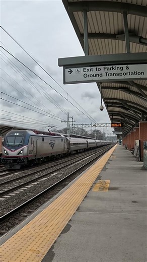 An Amtrak Northeast Regional speeds through West Haven, CT