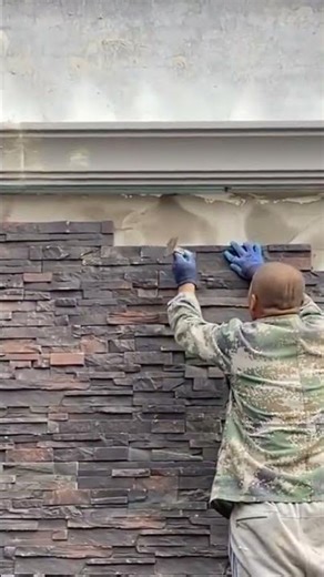 the process of installing stone tiles on the wall #construction #stone #tiles #wall #popular #shorts