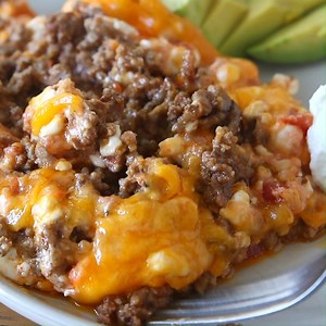 This easy Keto Taco Casserole recipe has only 5 ingredients and a 5 minute prep time. It is a lifesaver on busy weeknights. Ground meat combined with a creamy salsa sauce and plenty of cheese makes the perfect base for your favorite toppings. Recipe at: https://joyfilledeats.com/taco-casserole/ #ketogeendieet #lowcarbfoodideas #lowcarbfoodprep #lowcarbfooddiary #lowcarbfoodtips #lowcarbfoodfan #lowcarbfoodies #lowcarbfoodporn #lowcarbfoodshare #lowcarbrealfood #lowcarbfoodie #lowcarbfoods #ketof