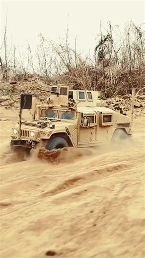 Humvee in Action on Afghan Gravel Road
