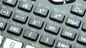 Math functions on a professional scientific calculator, many simple mathematical function buttons, symbol keys object macro, detail, extreme closeup, pan, nobody, panning shot, complex mathematics