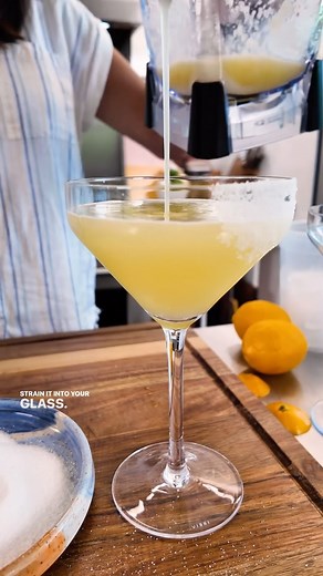 This Whole Meyer Lemon Drop is the ✨ summer beverage ✨ 🍋 Ingredients: 1 Meyer Lemon 1 tbsp sugar 1 cup of ice 1/2 cold water 2 ounces of vodka 🍸 How to make it: 1. Cut off the ends of Meyer lemon, then cut the lemon into chunks 2. Add the lemon chunks, sugar, ice, and vodka to the blender 3. BLEND 🕺 4. Strain the mixture and pour into a serving glass 5. Sip and enjoy 🍸 Tip: use the cut off ends of the lemon to rim your glass with sugar! 🧑‍🍳 📸: Nicole McLaughlin (@nicolemcmom) #lemondrop #