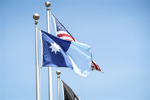 The new Minnesota state flag is flying outside some state offices today, but will others follow suit?